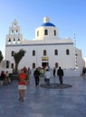 Tourists visiting Famous Church in Oia,Santorini