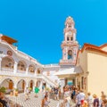 Tourists visiting famous monastery Panormitis on the island of Symi, Greece. Dodecanese