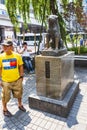 Tourists visiting Hachiko commemorative statue