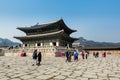 Tourists visiting Korean wooden traditional house in Gyeongbokgung, also known as Gyeongbokgung Palace or Gyeongbok Palace, the