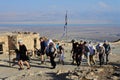 Tourists visiting at Masada ancient fortress in Holy land Israel Royalty Free Stock Photo