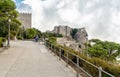 Tourists visiting medieval Venus Castle in historic town Erice at top of Mount Erice in Sicily.