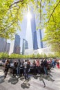Tourists visiting 9 11 memorial park in downtown Manhattan, located on the site as the original World Trade Center.