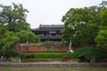 Tourists visiting Misty Rain Pavilion on Huxin Island in South Lake Scenic Area