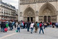 Tourists visiting the Notre Dame cathedral in Paris, France Royalty Free Stock Photo