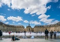 Tourists visiting the Place de la Bourse Royalty Free Stock Photo