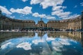 Tourists visiting the Place de la Bourse Royalty Free Stock Photo