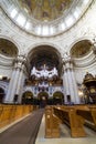 Tourists visiting and praying in Berlin Dome