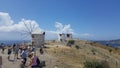 Tourists visiting ruins of old windmills in Bodrum, Turkey