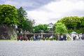 Tourists visiting Seimon Ishibashi Nijubashi Bridge, the most famous bridge at the Imperial Palace in Tokyo Royalty Free Stock Photo