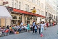 Tourists Visiting And Shopping Famous Brand Stores In Downtown Vienna