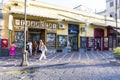 Tourists visiting a shopping street with souvenir shops