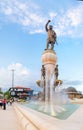 Tourists visiting Square and Statue and fountains of Filip II father of Alexander the Great, Skopje, Macedonia