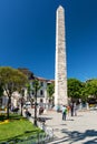 Tourists visiting the Walled Obelisk at the Hippodrome, Istanbul