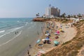 Tourists and visitors on beach Playa Cala Cerrada Orihuela Spain