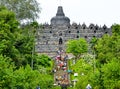 Tourists and visitors climbing steps of Borobudur Royalty Free Stock Photo