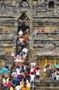 Tourists and visitors climbing steps of Borobudur Royalty Free Stock Photo