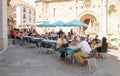 Tourists and visitors enjoying on the terraces of the small and quiet Spanish city of Zamora on a summer day.