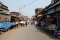 Tourists and visitors of famous Kalighat Kali Temple have rest near the shrine in Kolkata Royalty Free Stock Photo