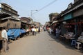 Tourists and visitors of famous Kalighat Kali Temple have rest near the shrine in Kolkata Royalty Free Stock Photo