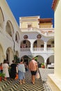 Tourists and visitors inside Panormitis monastery