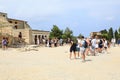 Tourists waiting in line on ruins of palace Knossos