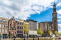 Tourists waiting in line to get in to the Anne Frank house in Amsterdam next to the Westertoren Royalty Free Stock Photo