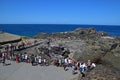 Tourists waiting patiently at Kiama Blowhole for the water to spray up