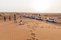 Tourists Waiting and Stop Cars for Sun Down on The Sand Dune of Dubai Royalty Free Stock Photo