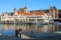 Tourists waiting for tour boat in Amsterdam, the Netherlands Royalty Free Stock Photo