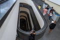 ROMA, ITALY - AUGUST 2018: Tourists walk along the ancient spiral stairs to the Vatican museums