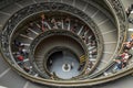 ROMA, ITALY - AUGUST 2018: Tourists walk along the ancient spiral stairs to the Vatican museums