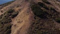 Tourists Walk Along A Mountain Ridge Aerial