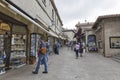 Tourists walk along the souvenir shops in San Marino.