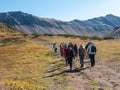 Tourists walk along the Vachkazhets ridge. Kamchatka Peninsula, Russia