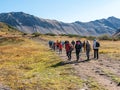 Tourists walk along the Vachkazhets ridge. Kamchatka Peninsula, Russia