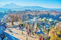 The tourists walk on bastions of Salzburg Castle, Austria Royalty Free Stock Photo