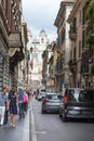 Tourists walk down the street Via dei Condotti, Rome