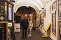 Prague, Czech Republic - March 10, 2020. Tourists walk in the historical center of Prague at night