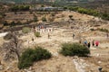 Tourists walk through the Lion`s Gate of Mycenae citadel Royalty Free Stock Photo