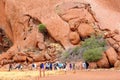 Tourists walk the Mala Walk around Uluru Ayers Rock, Australia Royalty Free Stock Photo