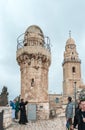 Tourists walk on the roof of the building, which houses the tomb of King David and see the sights in old city of Jerusalem, Israel Royalty Free Stock Photo