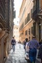 Tourists walk on Via Giustiniani