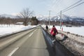 Tourists walked along the road to the top of the city. Furano hokkaido because there are no buses and taxi services