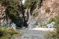 Tourists walking in Alcantara Gorge and Alcantara river park in Sicily Island, Italy.