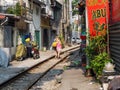 tourists walking along the famous train street in Hanoi,Vietnam