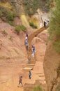 Tourists walking along stairs at the Sentier des Ocres, Roussillon, Vaucluse, Provence-Alpes-CÃÂ´te d`Azur