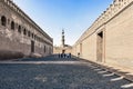 Tourists walking around Ahmed Ibn Tulun, mosque in Cairo, Egypt Royalty Free Stock Photo