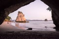 Tourists walking on beach at Cathedral Cove, Coromandel Peninsula, New Zealand Royalty Free Stock Photo