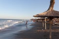 Tourists walking on the beach